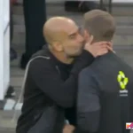 Pep Guardiola kiss official
